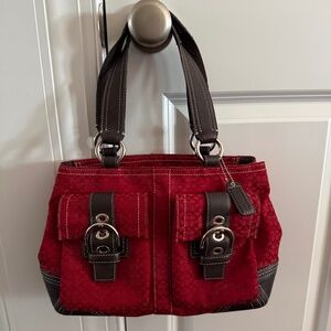 Coach red and brown purse.